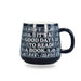 Ceramic mug featuring "It's A Good Day To Read A Book" quote for book lovers enjoying coffee or tea.