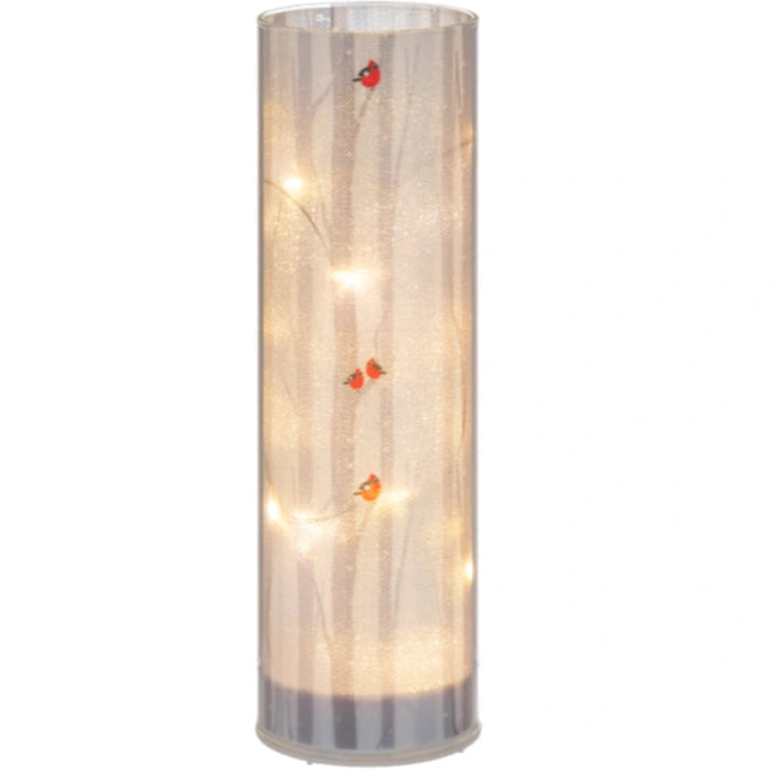 The Ganz LED Light Up Cardinal on Birch Tree Pillar Set features a vibrant red cardinal perched on a beautifully detailed birch tree pillar illuminated by soft LED light.