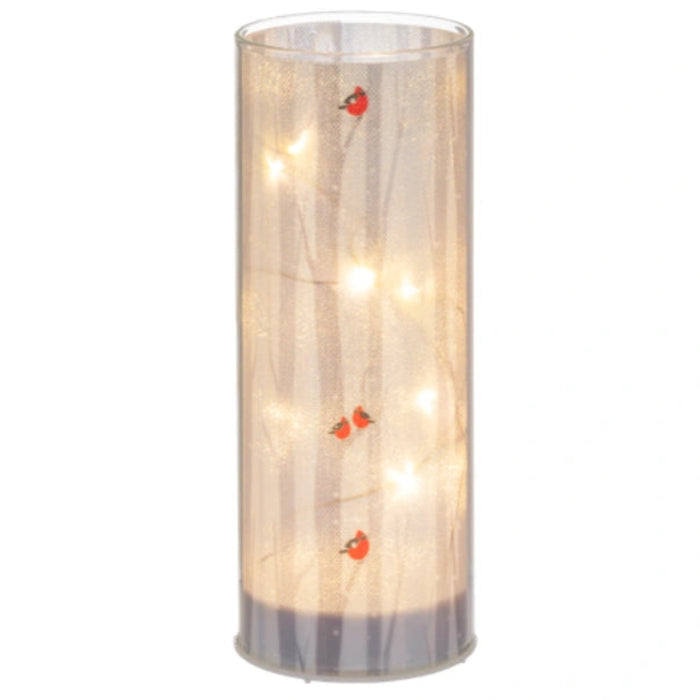 The Ganz LED Light Up Cardinal on Birch Tree Pillar Set features a vibrant red cardinal perched on a beautifully detailed birch tree pillar illuminated by soft LED light.