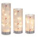 The Ganz LED Light Up Cardinal on Birch Tree Pillar Set features a vibrant red cardinal perched on a beautifully detailed birch tree pillar illuminated by soft LED light.