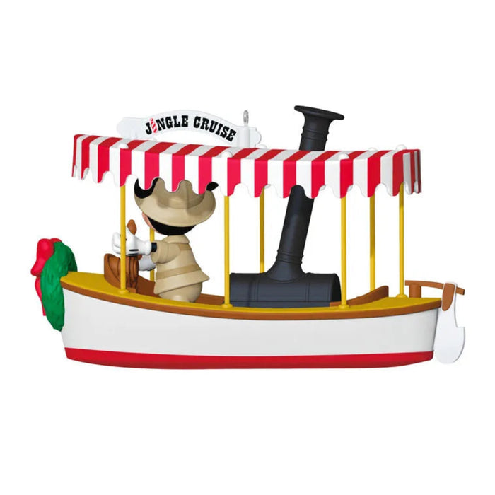 Model of a boat with a character inside, resembling a scene from 'Jungle Cruise'.