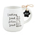 Mud Pie Feline Good Mug in white ceramic with black cat illustration and “Looking good, feline good” text, featuring a “NEEDY” paw charm tag.