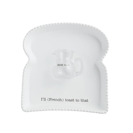Mud Pie French Toast Platter set featuring toast-shaped ceramic plate with “I’ll (French) toast to that” text and glass syrup pitcher labeled “Stick to it.”