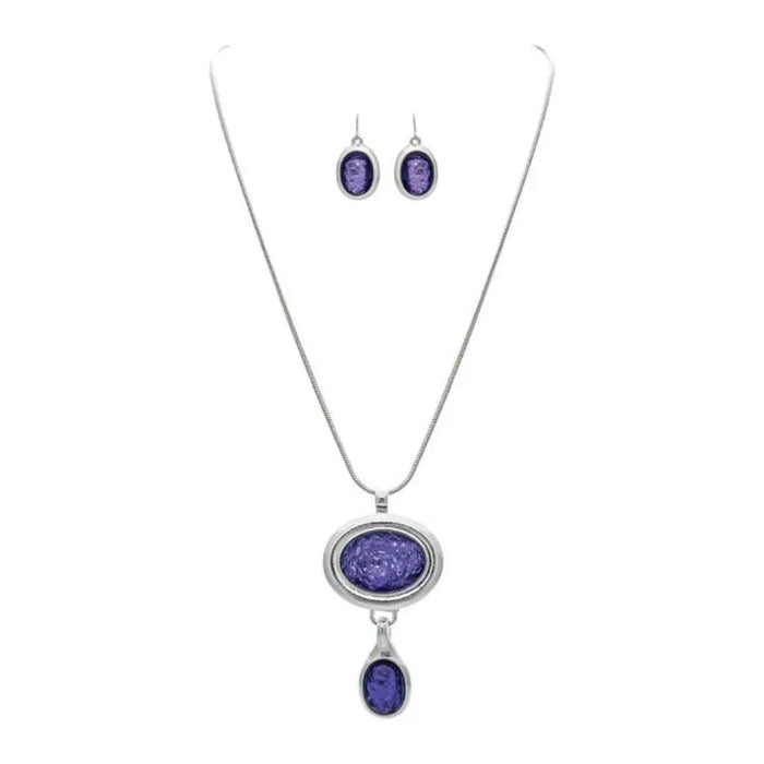 Rain Jewelry silver-tone necklace set with purple foiled oval gems and matching drop-style accents.