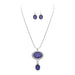 Rain Jewelry silver-tone necklace set with purple foiled oval gems and matching drop-style accents.