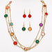 Rain Jewelry gold-colored layered chain necklace set with multicolor jewel accents.