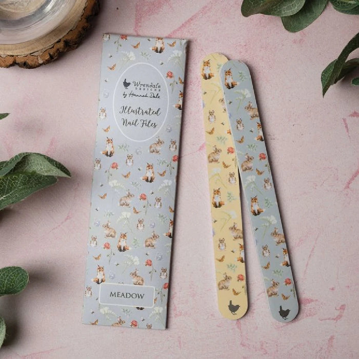 A pair of wooden toothbrushes adorned with a charming fox print, emphasizing sustainability and style in oral care.