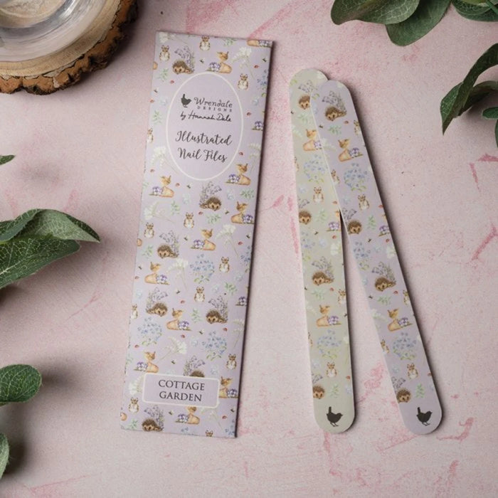 Two nail files resting on a white background, highlighting their sleek design and functionality for nail care.