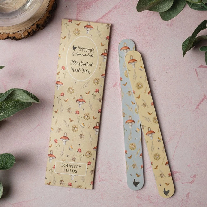 Two eco-friendly wooden toothbrushes, each decorated with a whimsical fox design, perfect for a fun dental routine.
