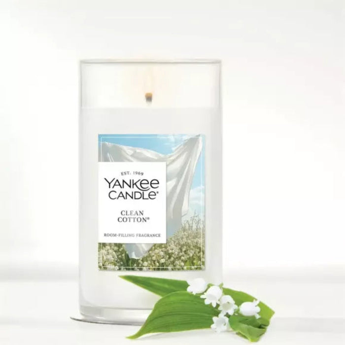 Yankee Candle Clean Cotton 14.25 oz. medium pillar candle with a classic white wax design and fresh linen-inspired fragrance.