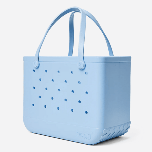 Original Bogg Bag in Blue Skies – large light blue waterproof tote with perforated sides and dual handles, ideal for beach, travel, or daily use.