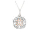A silver and rose gold pendant featuring a delicate flower design.