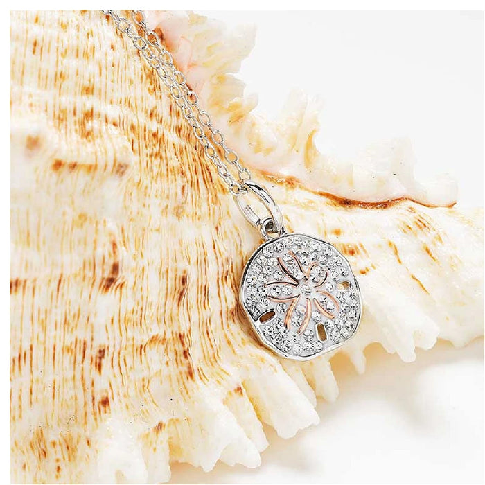 A floral pendant crafted from silver and rose gold, showcasing elegance.