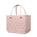 Side view of the Original Bogg Bag in Quilted Rose Petal featuring quilted texture, ventilation holes, and sturdy handles