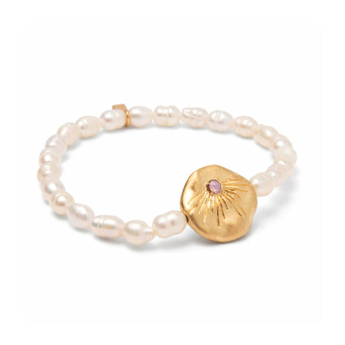 A delicate bracelet adorned with shimmering pearls, representing love and elegance, suitable for gifting or personal use.