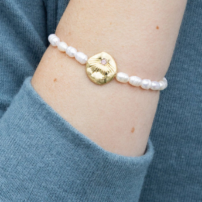 Graceful bracelet showcasing pearls, a timeless representation of love and devotion.