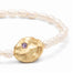 Stylish pearls of protection bracelet, highlighting its elegance and significance, set on a textured surface.