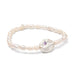 Elegant white pearl bracelet adorned with a purple gemstone.