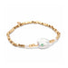Elegant "pearls of courage" bracelet showcasing shimmering pearls, representing bravery and inner strength in a stylish design.