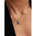 Model wearing the PANDORA Blue Butterfly Pendant Necklace, showing the blue crystal butterfly pendant resting elegantly on the neckline.
