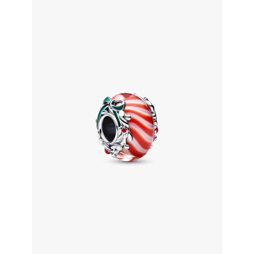 Close-up of the Pandora Candy Murano Glass Charm featuring red and white swirl Murano glass with silver holly leaf and berry detailing.
