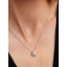 Model wearing the Pandora Crescent Moon Pendant Necklace, showcasing the sparkling crescent moon pendant resting at the collarbone.