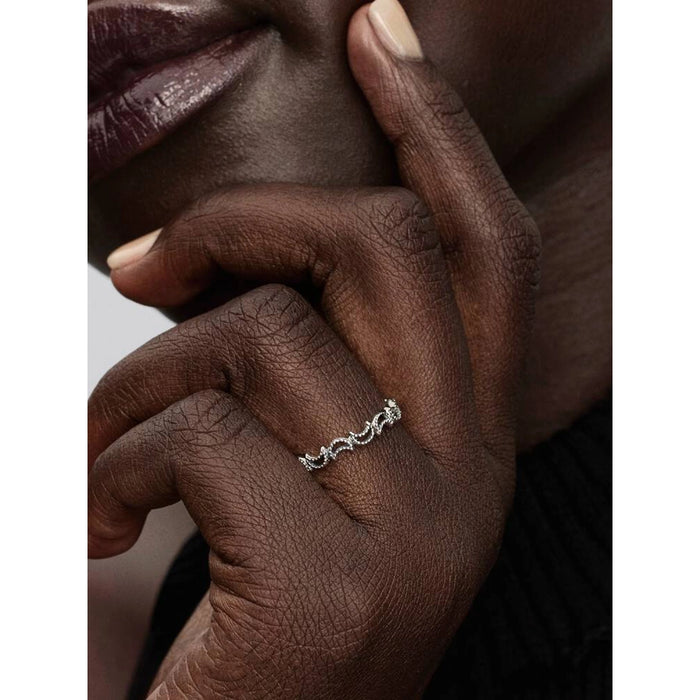 Pandora crescent moon ring worn on model’s finger in lifestyle fashion jewelry photo