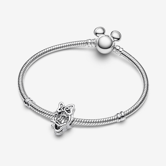 Pandora Moments snake chain bracelet featuring Pandora Disney Daisy Duck Openwork Charm in sterling silver minimalist design.