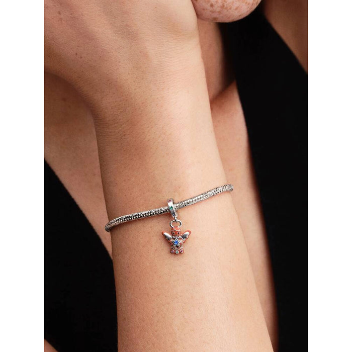 Gingerbread Angel Dangle Charm worn on a Pandora bracelet, shown on wrist for size and styling reference.