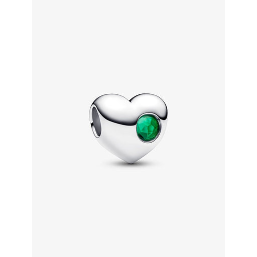 A standalone silver Pandora heart-shaped charm with a faceted green stone accent on a white background.