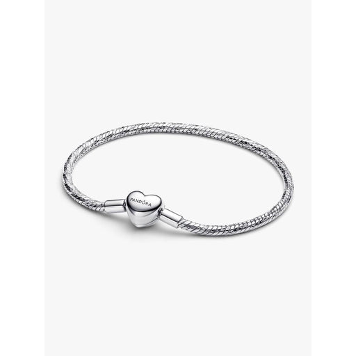 Close-up of the Pandora Heart Clasp Faceted Snake Chain Bracelet in sterling silver on a white background.