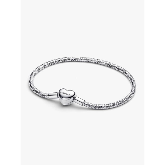 Close-up of the Pandora Heart Clasp Faceted Snake Chain Bracelet in sterling silver on a white background.