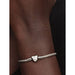 Pandora Heart Clasp Faceted Snake Chain Bracelet worn on wrist, showcasing polished heart clasp detail.