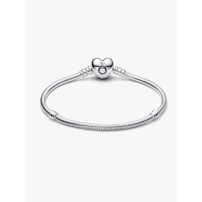 Pandora sterling silver snake-chain bracelet with heart-shaped clasp.