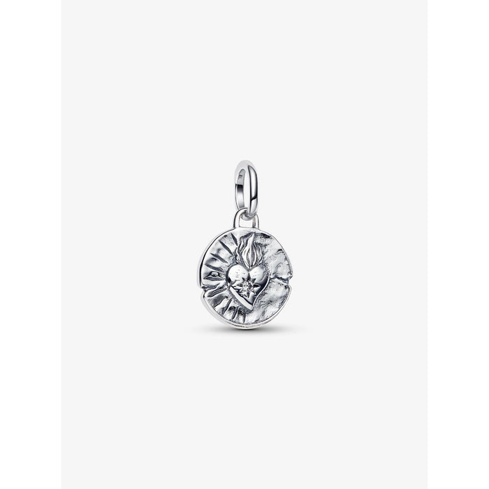 Close-up of the Pandora Heart Medallion Charm with a raised flaming heart design on the front.