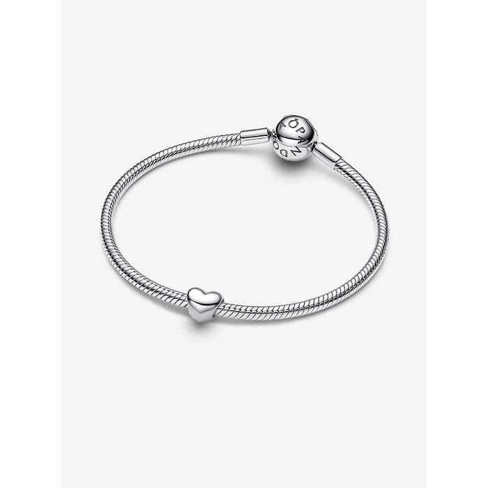 Pandora snake chain bracelet featuring the Heart Mini Charm in sterling silver, placed at the center.