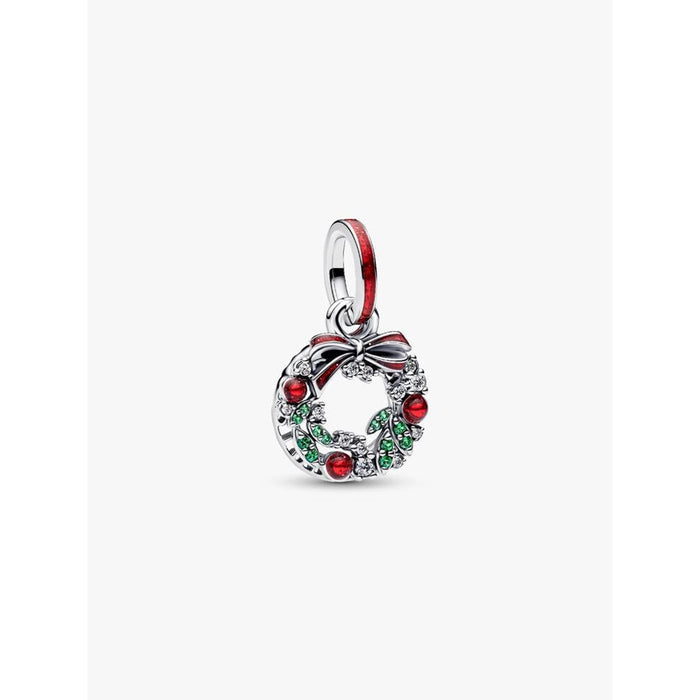 Close-up of the Pandora Holiday Wreath Double Dangle Charm with red and green cubic zirconia and bow detail.