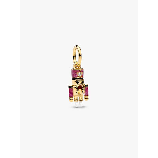Close-up of the Pandora Moveable Nutcracker Dangle Charm in gold with pink glitter enamel.