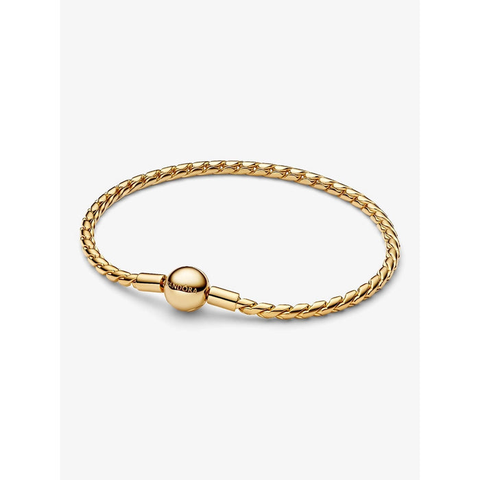 Pandora gold bracelet with round clasp and woven chain, product close-up.