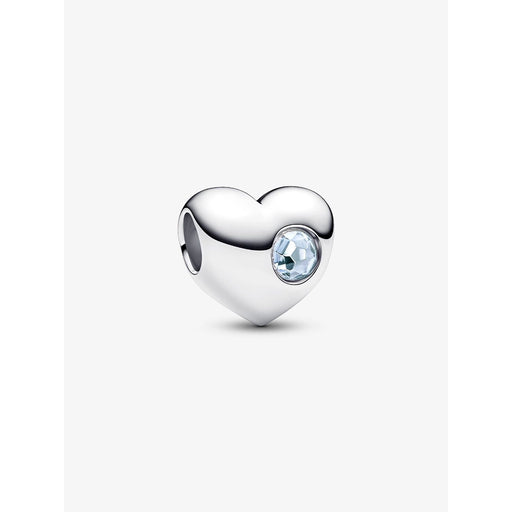 Close-up of Pandora Engravable Sea Aqua Blue Stone Heart Charm in sterling silver with round aqua gemstone.