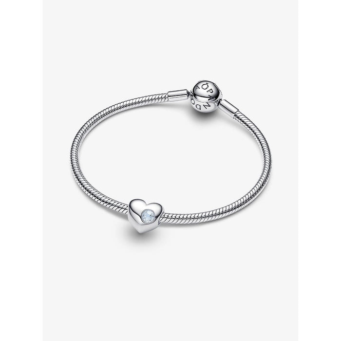 Pandora silver bracelet with heart-shaped charm featuring a sea aqua blue stone.