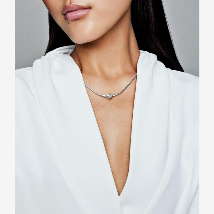 Pandora Snake Chain Necklace worn on model styled with a white outfit for an elegant look