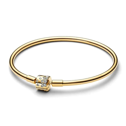 Side angle view of the gold Pandora barrel clasp bangle sparkling with cubic zirconia stones