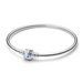 Side angle view of the silver Pandora barrel clasp bangle sparkling with blue cubic zirconia stones