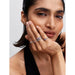 Model wearing Pandora Sparkling Butterfly Ring collection stacked