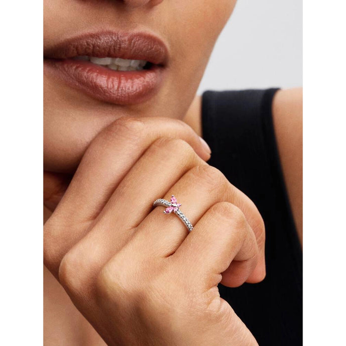 Pandora Sparkling Pink Butterfly Ring on hand, sterling silver pavé band with pink butterfly stones, elegant everyday jewelry