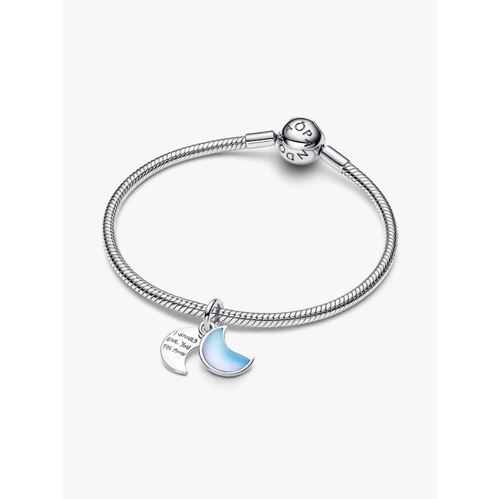 Pandora Sparkling Silver Crescent Moon Dangle Charm displayed on Pandora Moments snake chain bracelet.
