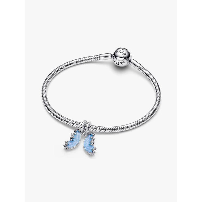 Pandora Splittable Butterfly Dangle Charm with blue enamel wings on a silver Pandora Moments bracelet.