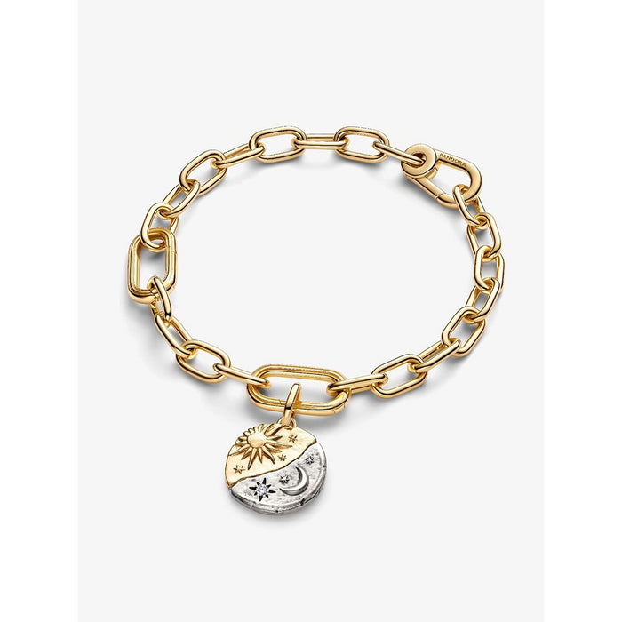 Pandora gold link bracelet featuring celestial coin charm with sun, moon, and star design.