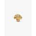 Gold mushroom charm with textured cap and dotted details on white background